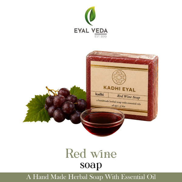 Red wine soap with grapes and a bowl of red wine, branded as Eyal Veda.